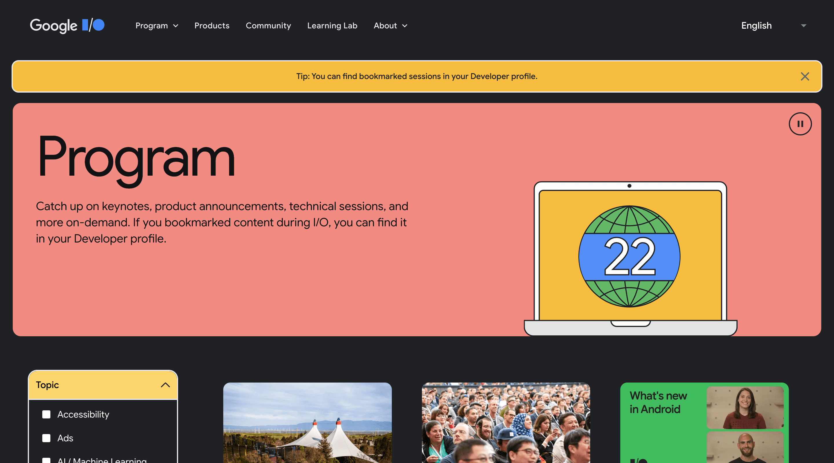 Screenshot of the Google I/O 2022 'Program' page. The header contains the Google I/O logo, the main navigation, and a language selector. The hero section contains an introduction paragraph and an illustration of a laptop with the number '22' on the screen.